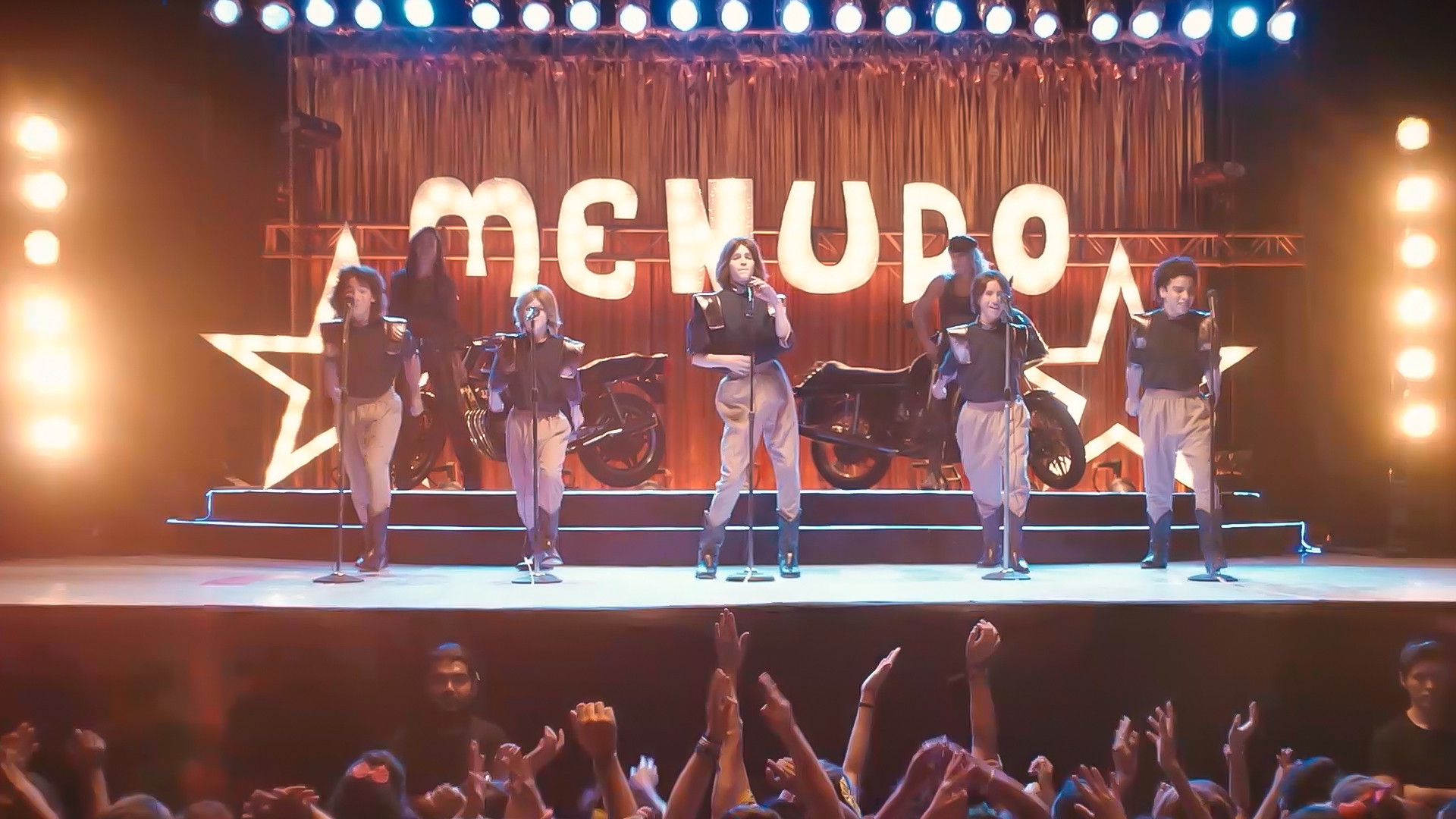 Súbete a mi moto Background