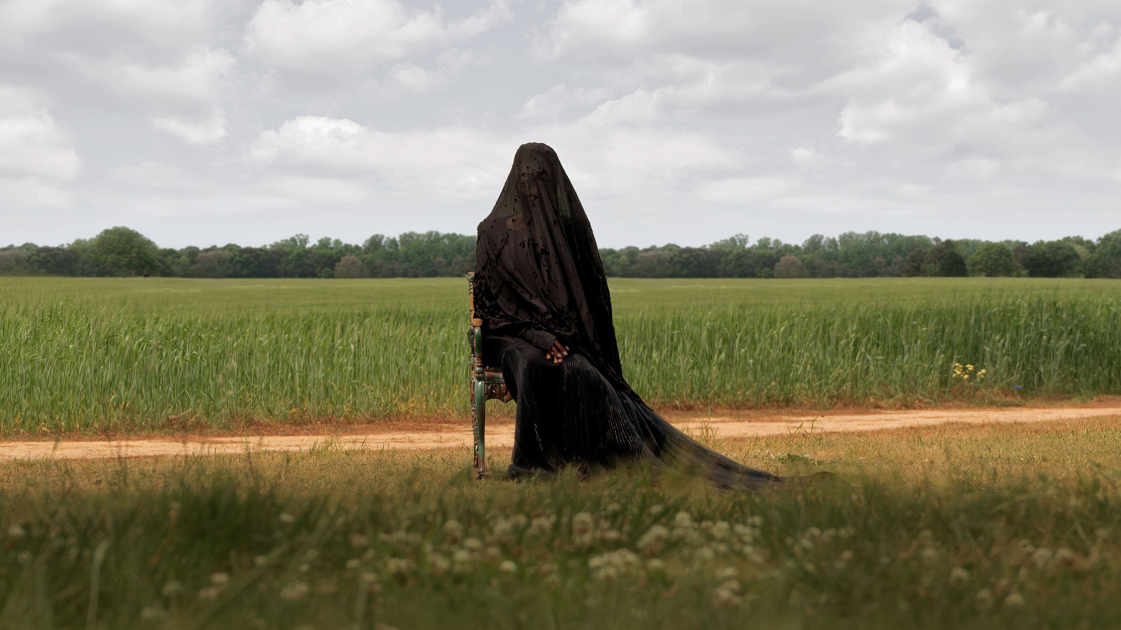 The Woman in the Yard Background