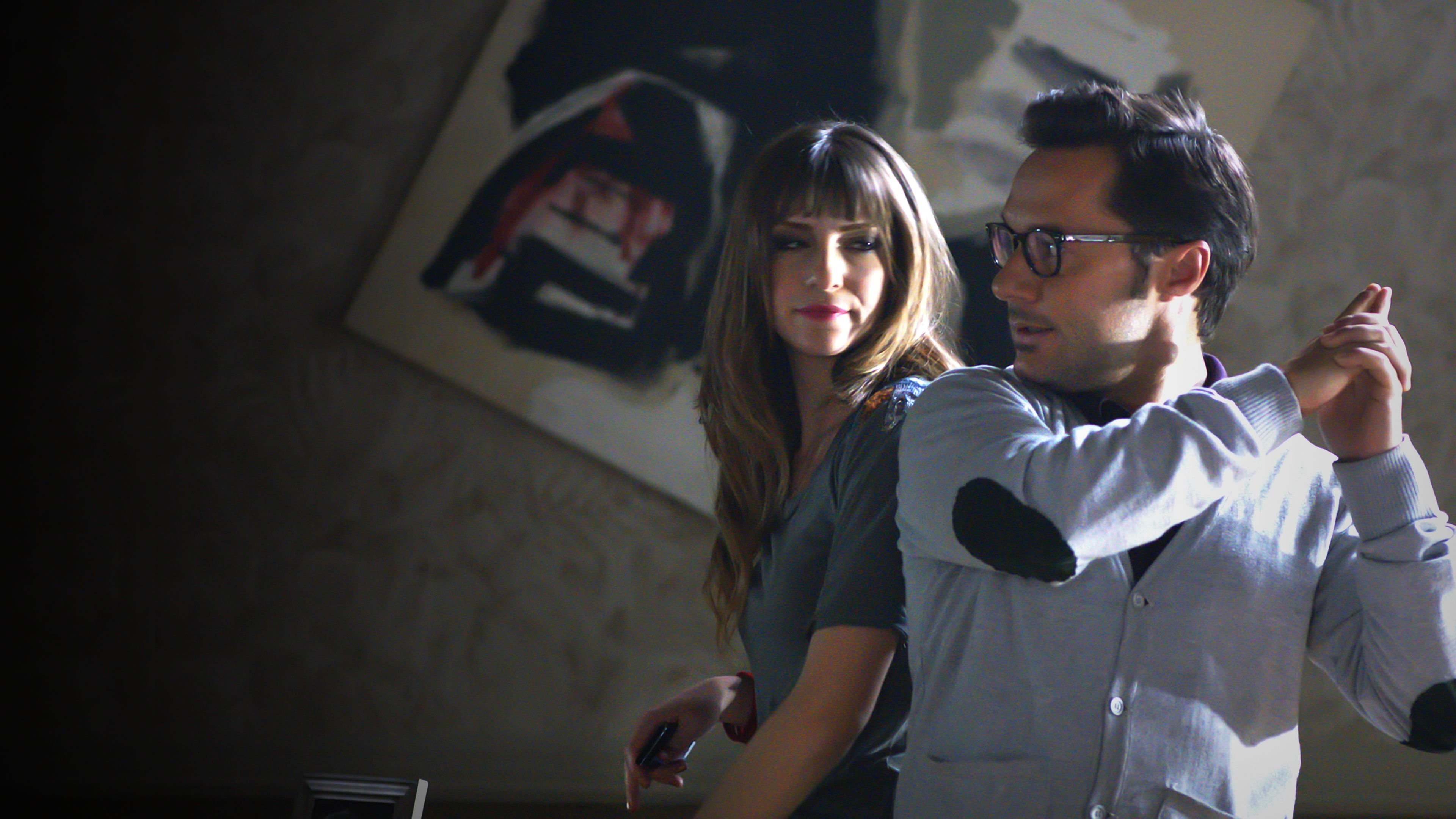 Extraños en la noche Background