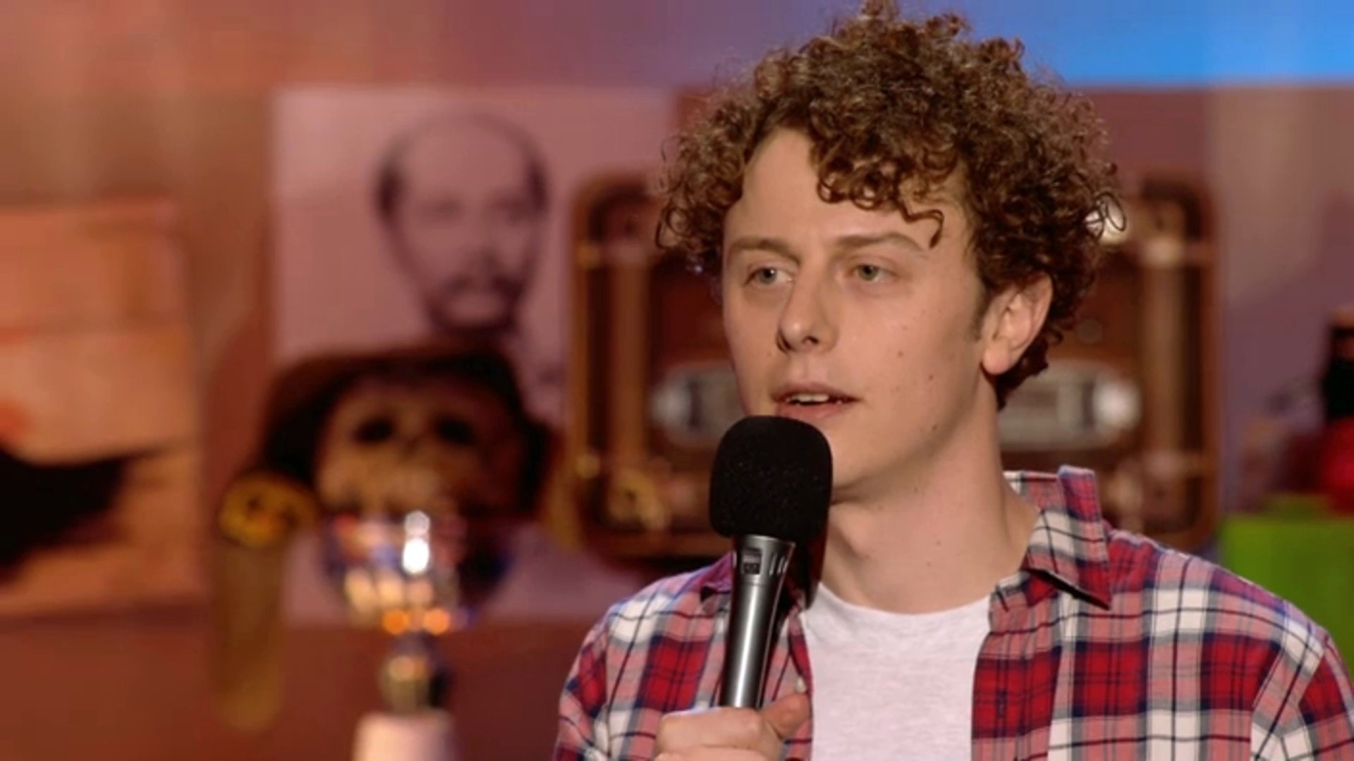 Norman on stage Background