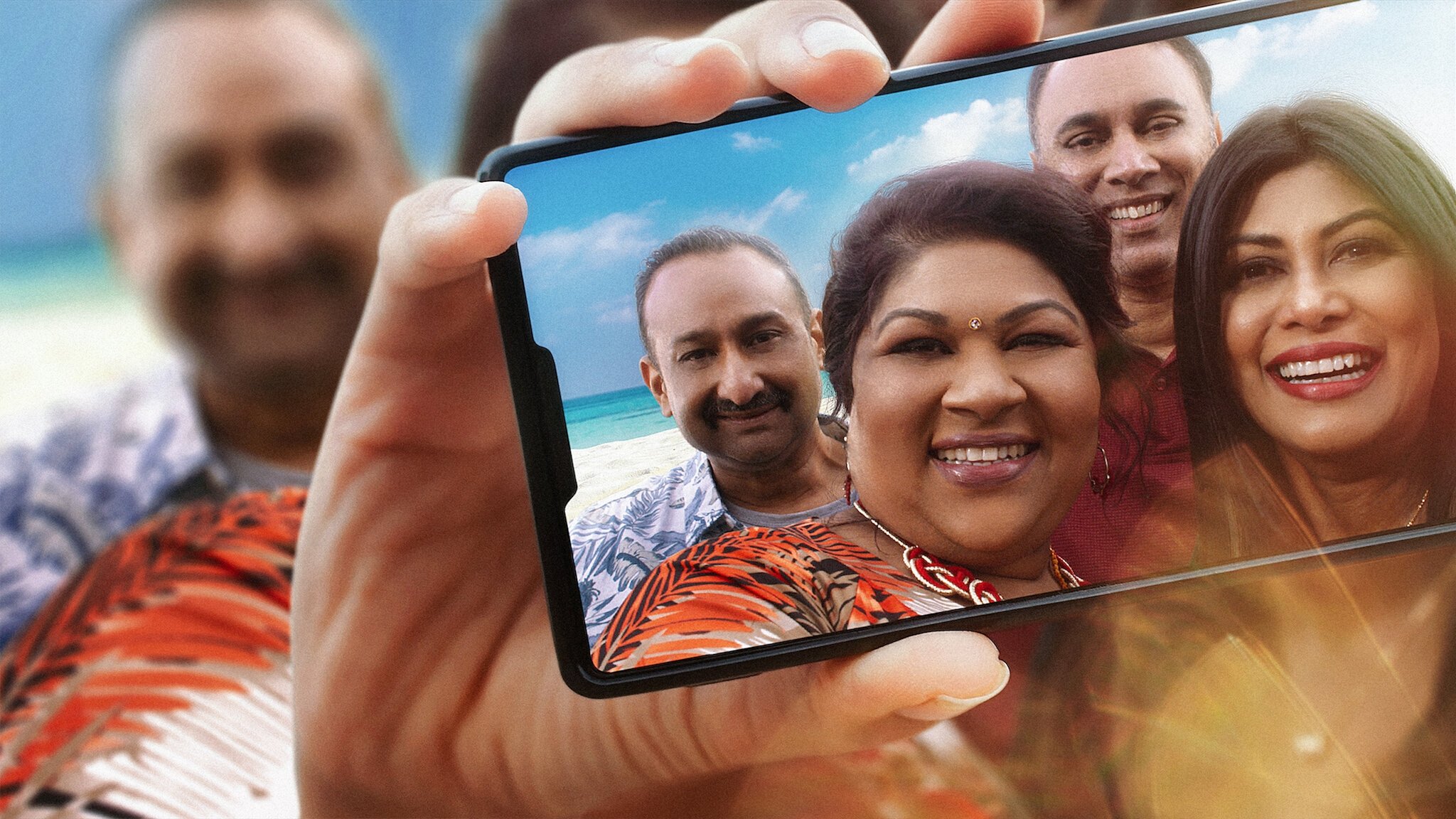 Trippin’ with the Kandasamys Background