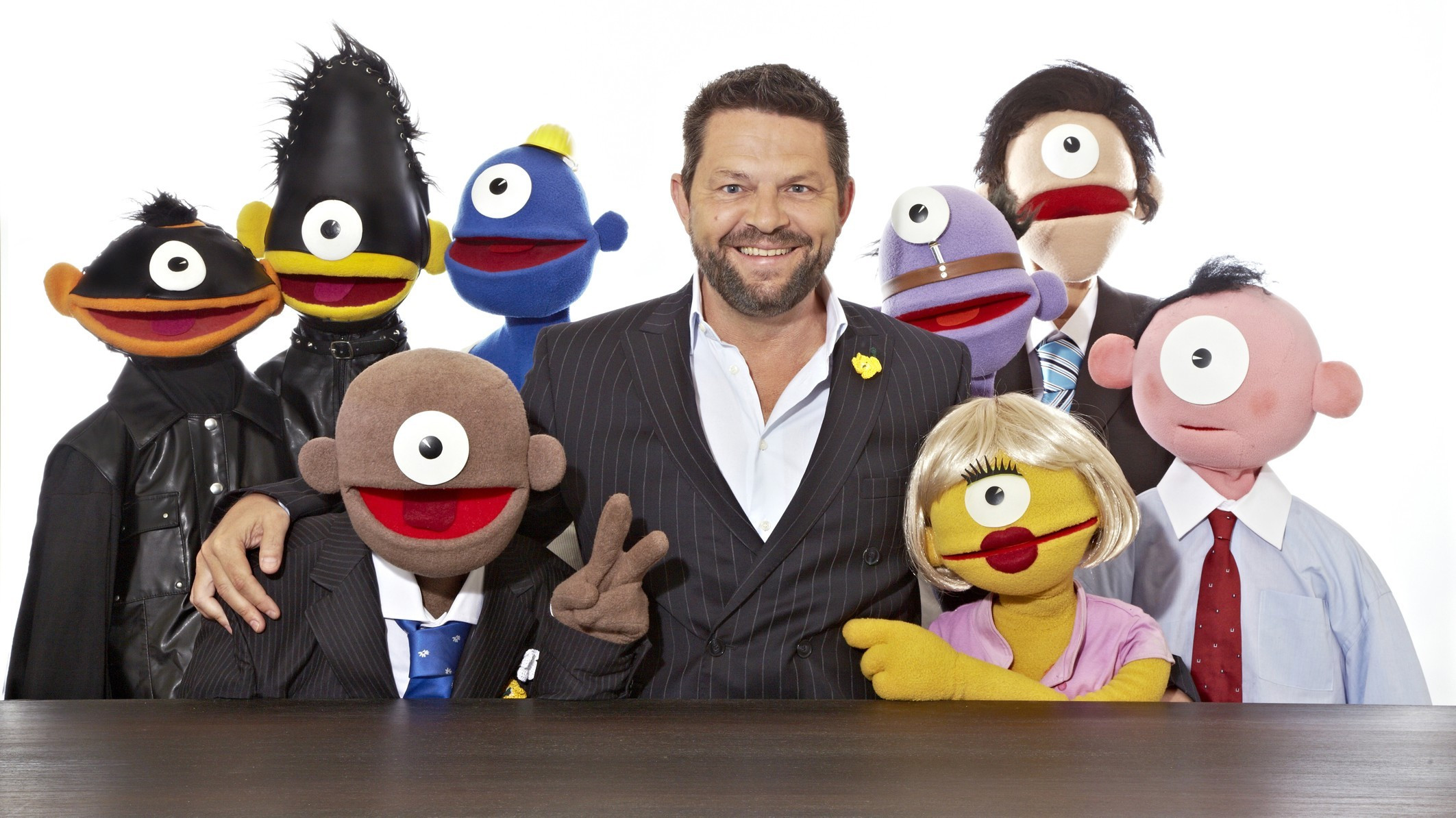 Eye TV - der durchgeknallte Puppensender Background