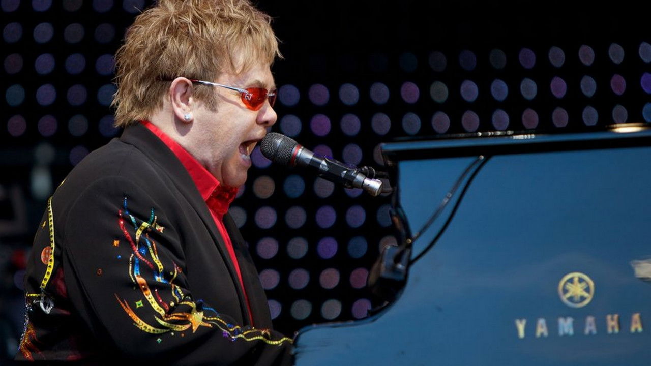 Elton John: A Singular Man Background