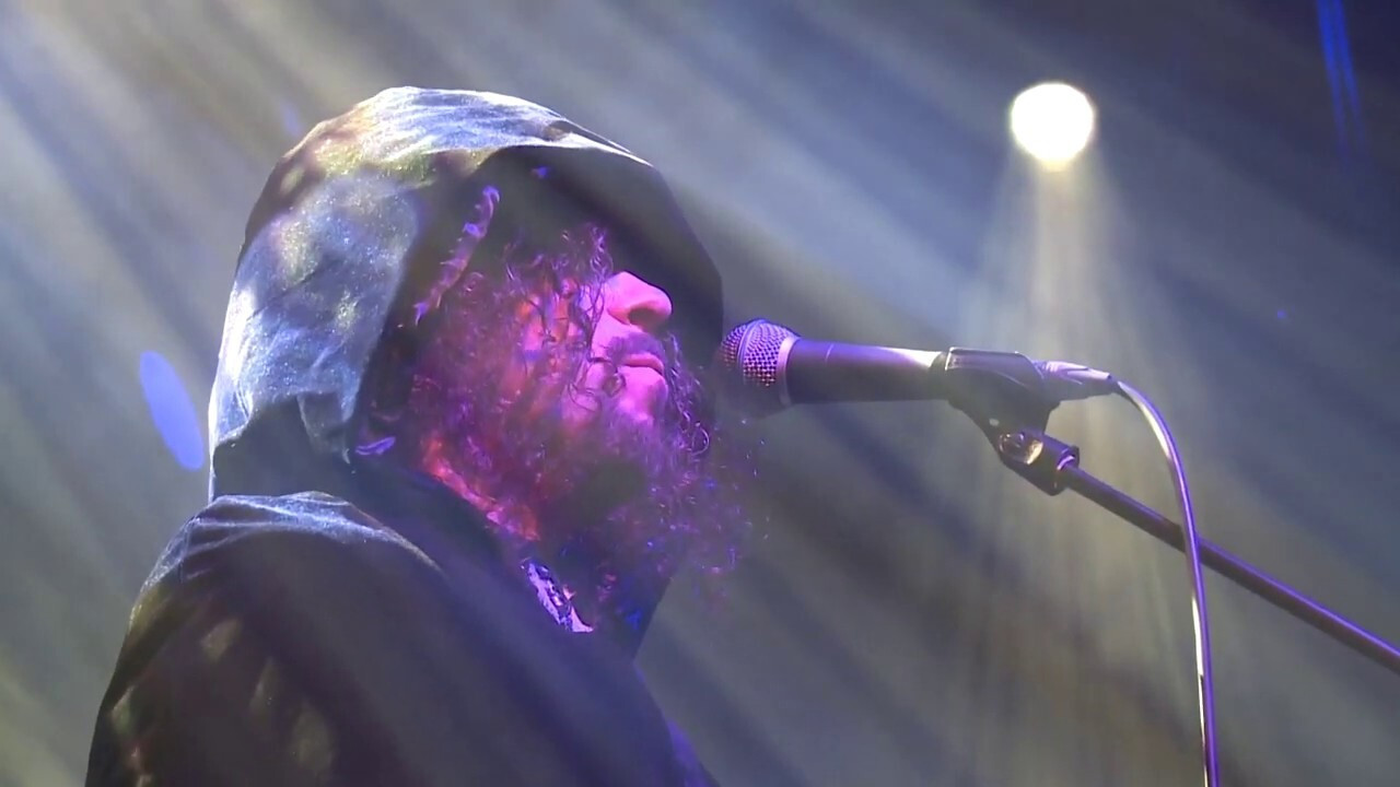 Arena Re-Visited Live! Background