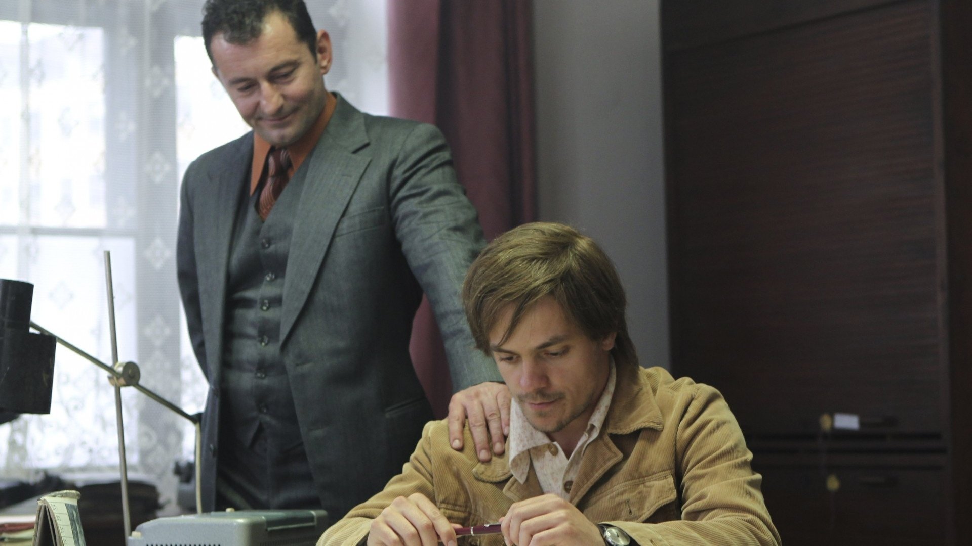 The Confidant Background