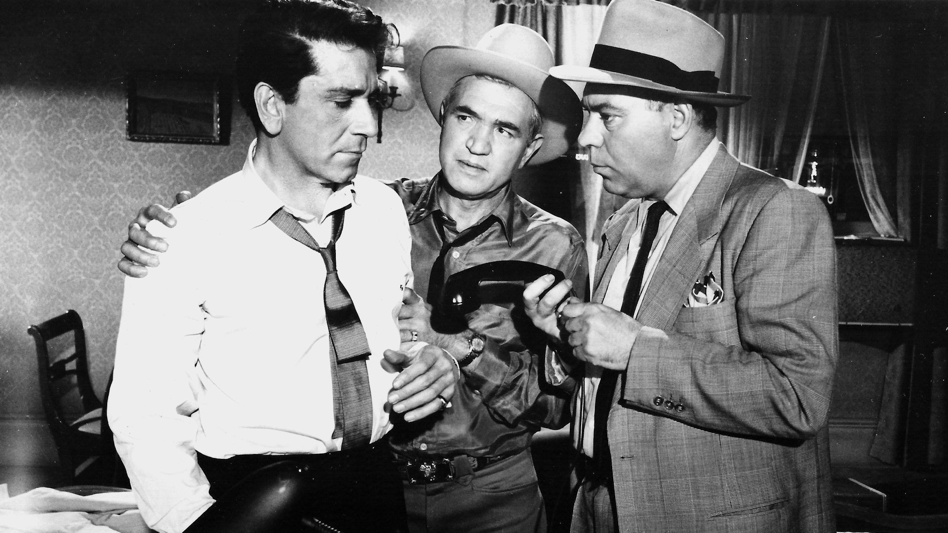 The Brothers Rico Background