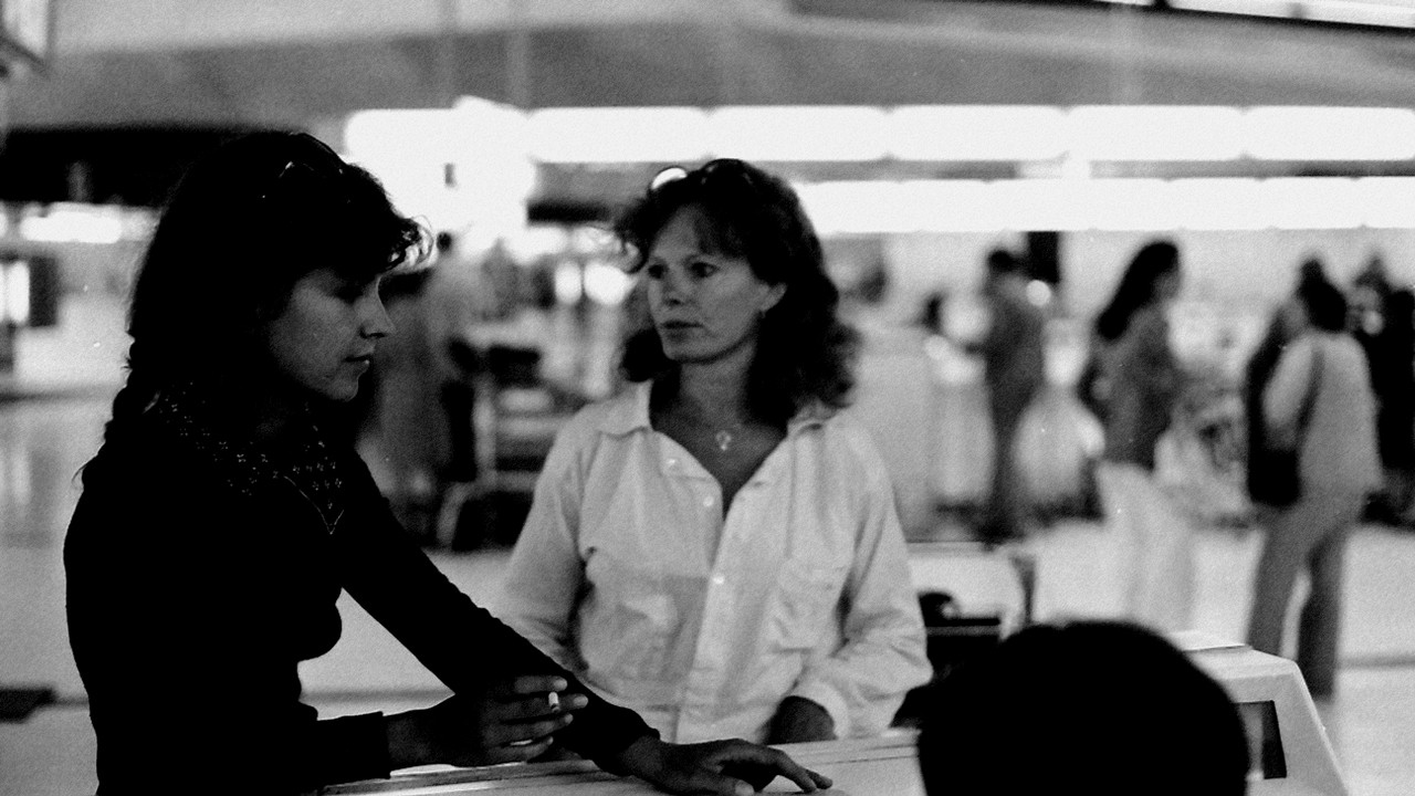 Delphine and Carole Background