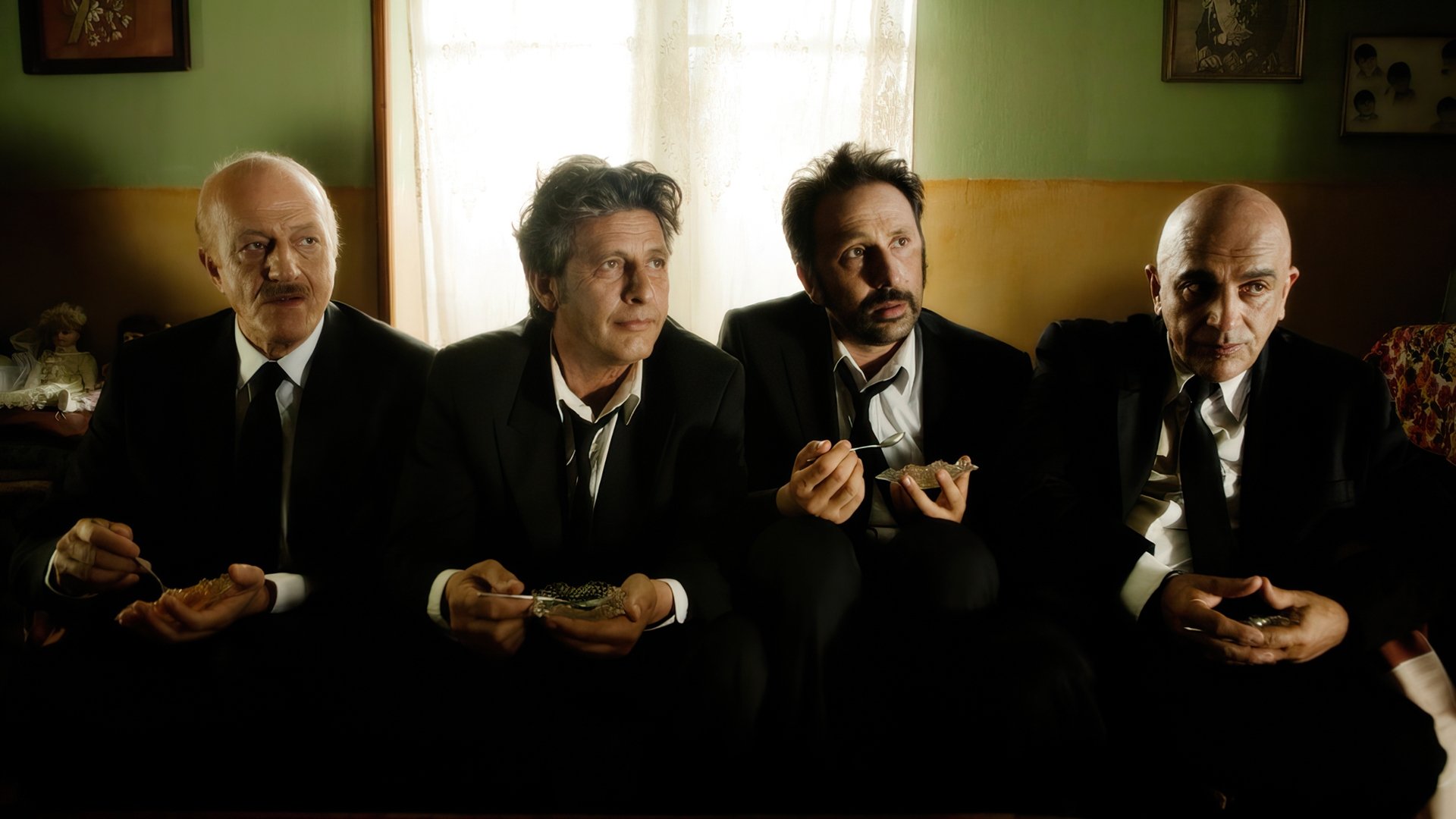 4 Black Suits Background